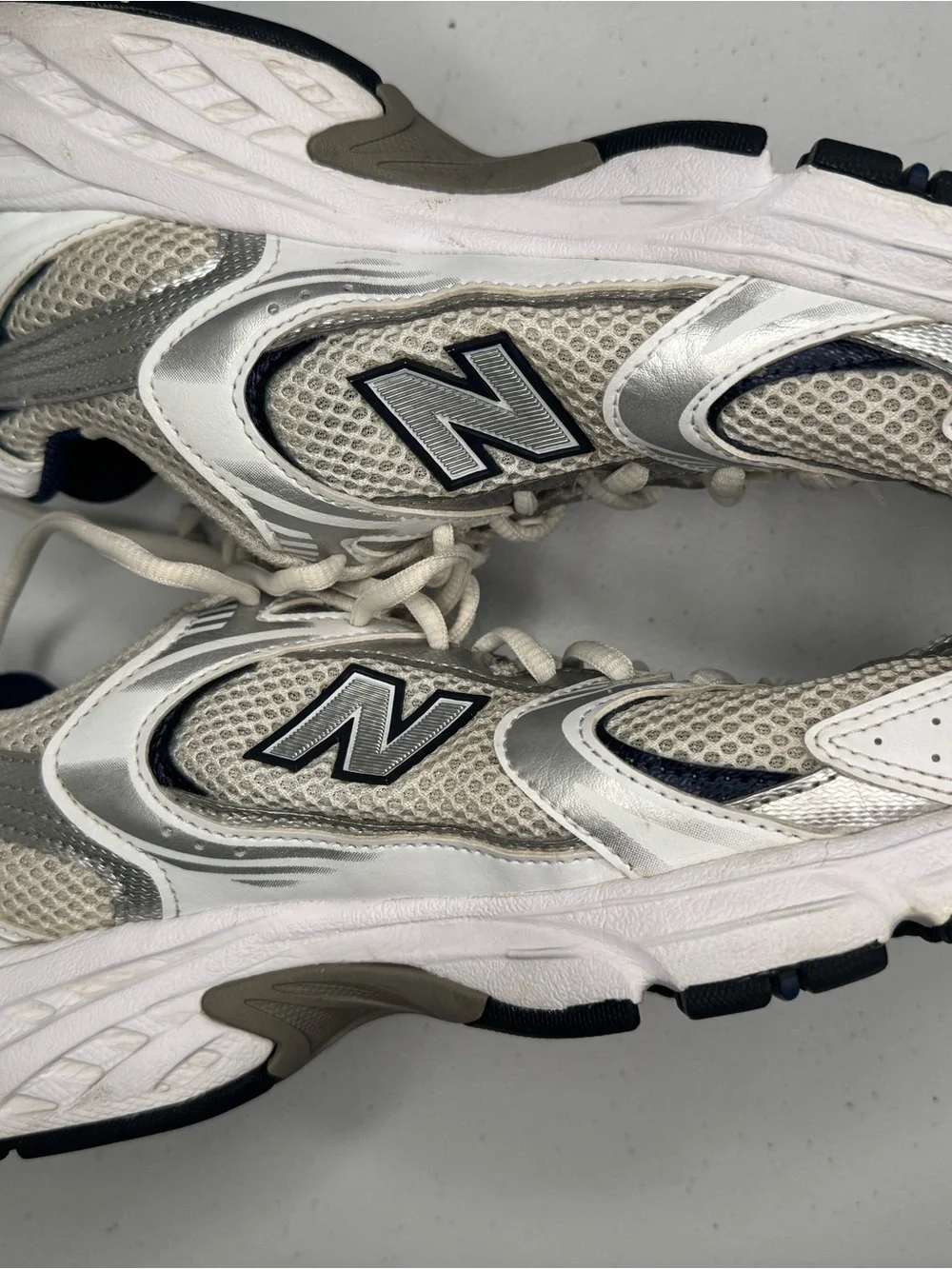 New Balance White and Silver Athletic Sneakers